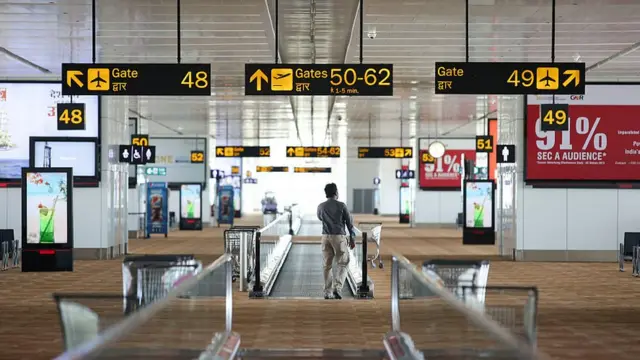 A man waiting at the airport