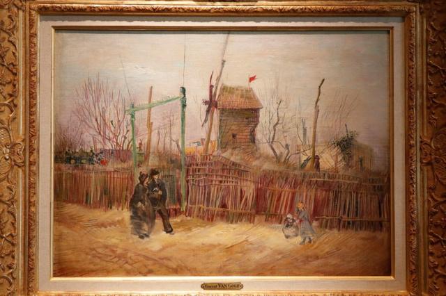 A Street Scene in Montmartre by Vincent Van Gogh