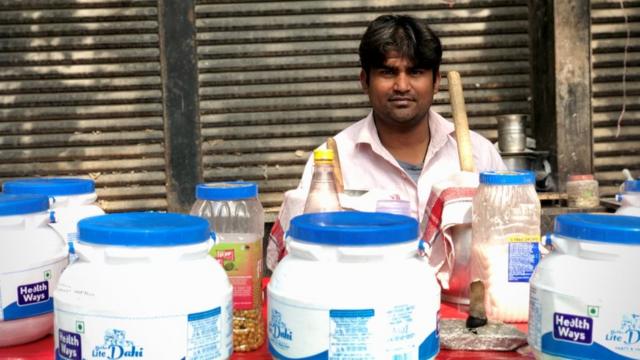 Mohammed Sabir sat at his tiny stall selling yogurt-based drinks