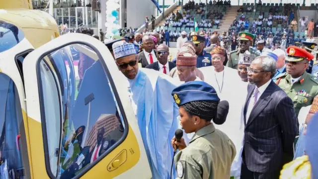 Tolulope Arotile with Nigeria President Muhammadu Buhari