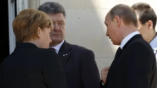 Лідери Німечини, України та Росії - архівне фото червень 2014 року.