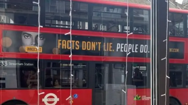 Bus with Michael Jackson advert on am wey say, "Facts o dey lie. Pipo lie."
