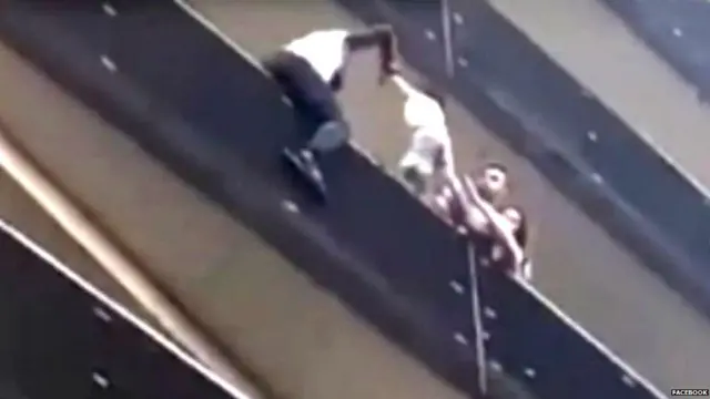 Mamoudou Gassama scales building to rescue child. 27 May 2018