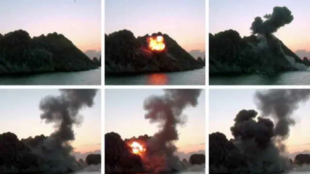 노동신문이 30일 공개한 초대형 방사포 시험사격 모습