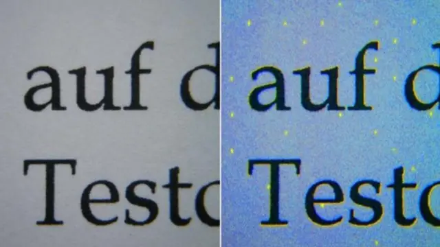 Dots from a HP Laserjet printer, illuminated with blue light