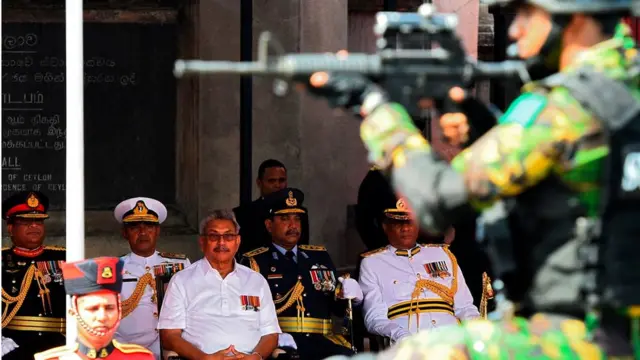 Sri Lankan president Gotabaya Rajapaksa (2L) gestures as he leaves after attending an event for the swearing in of the new cabinet ministers at the historical ''Magul Maduwa''/ ''Assembly Hall'' situated at the Temple of the Sacred Tooth Relic where the ancient Sri Lankan kings met their ministers and carried out daily administrative tasks at Kandy, Sri Lanka 12 August 2020. (Photo by Tharaka Basnayaka/NurPhoto via Getty Images)