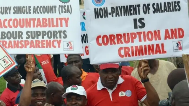 Workers under di platform of Nigeria Labour Congress march to support di fight against corruption for 2015