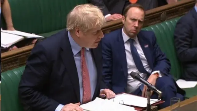 Mr Johnson and Mr Hancock were seen together and following social distancing advice at PMQs on Wednesday