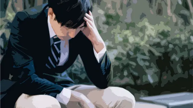 ਚਿੰਤਾ ਵਿੱਚ ਇੱਕ ਮੁੰਡੇ ਦੀ ਫਾਈਲ ਫੋਟੋ