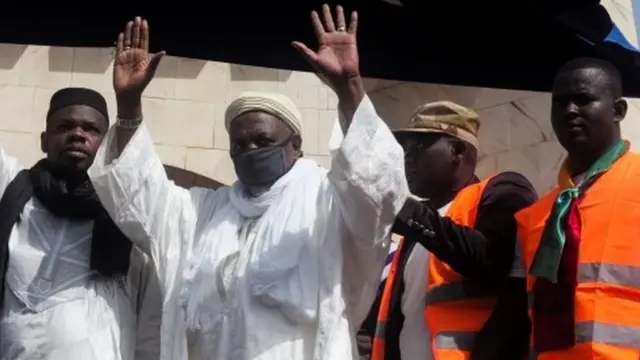 Imam Mahmoud Dicko greets his supporters during a protest demanding the resignation of Mali"s President Ibrahim Boubacar Keita at Independence Square in Bamako, Mali June 19, 2020