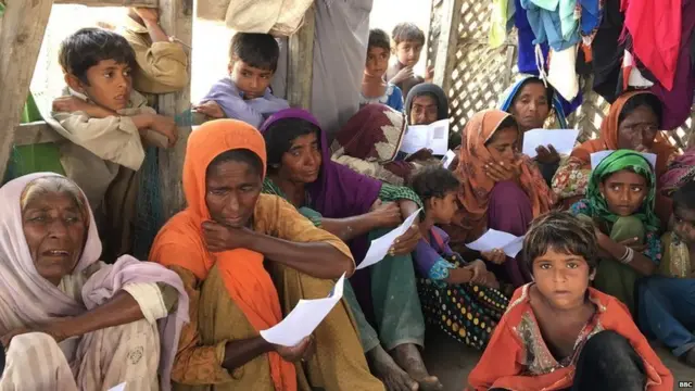 Wives and mothers of detained fishermen in Jhangisar village in Pakistan