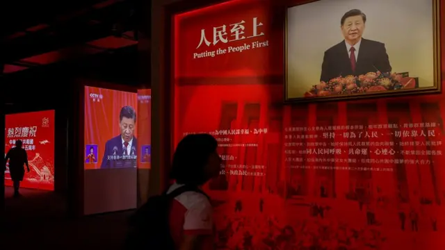 A photo of Chinese President Xi Jinping is displayed at the National Security Exhibition Gallery, ahead of China's 75th National Day in Hong Kong, China September 23, 2024. REUTERS/Tyrone Siu