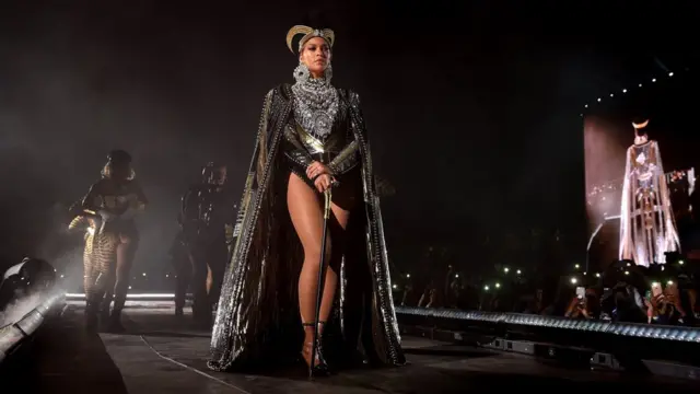 Beyoncé performs in an outfit inspired by Queen Nefertiti at the Coachella festival in California (14 April 2018)