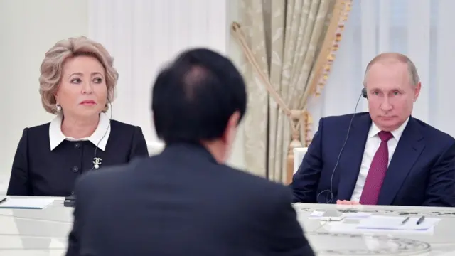 File pic of Russian Federation Council Chairwoman Valentina Matviyenko (L) and Russia's President Vladimir Putin