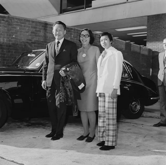 Lee Kuan Yew (1923 - 2015), the first Prime Minister of Singapore, arrives at London Airport with his wife Kwa Geok Choo (1920 - 2010) and their daughter Lee Wei Ling