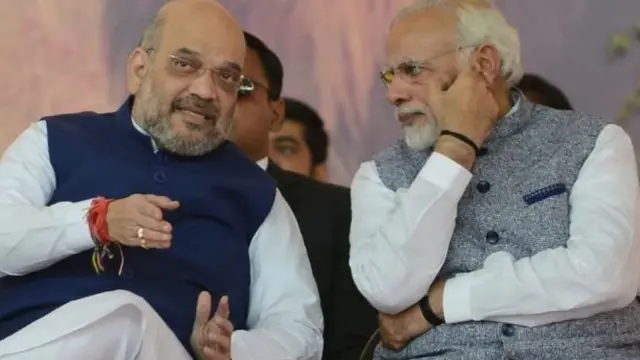 નરેન્દ્ર મોદી અને અમિત શાહની તસવીર