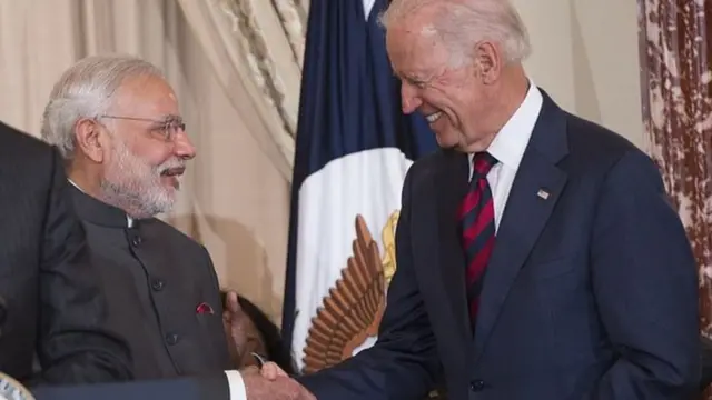 साल 2014 में वाशिंगटन में हाथ मिलाते नरेंद्र मोदी और जो बाइडन
