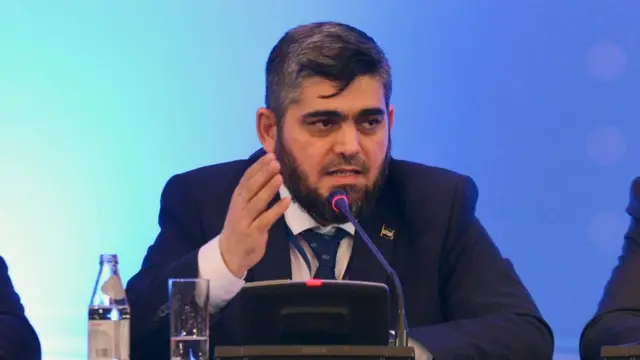 رئيس وفد المعارضة محمد علوش في مؤتمر صحفي عقب انتهاء محادثات أستانة