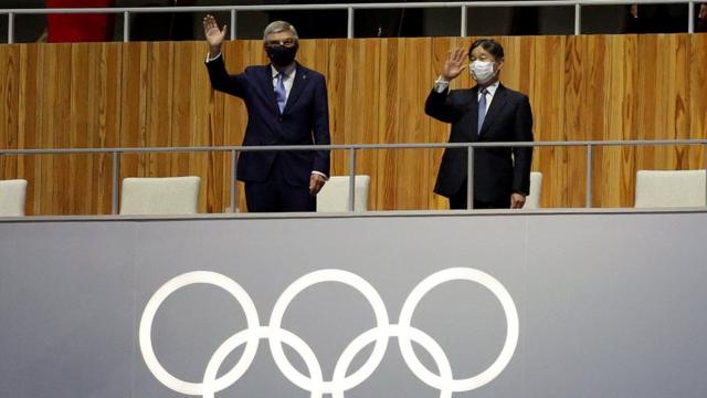 Thomas Bach, IOC President and Emperor Naruhito, President of the Tokyo Olympic and Paralympic Games look on during the Opening Ceremony of the Tokyo 2020 Olympic Games at Olympic Stadium on July 23, 2021 in Tokyo, Japan.