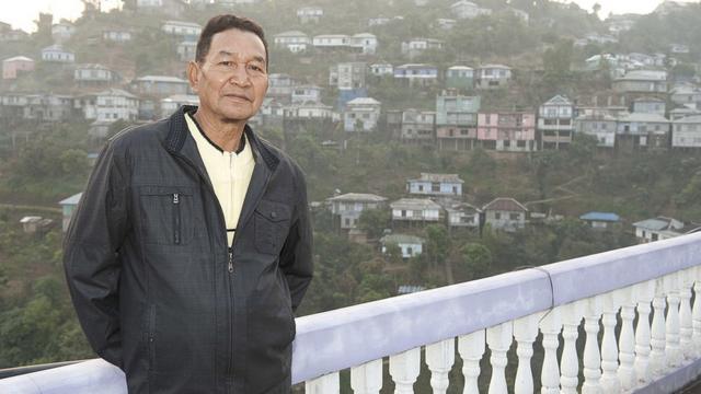 Mr Ziona, 67, poses for a photograph on January 31, 2011 in Baktawang,