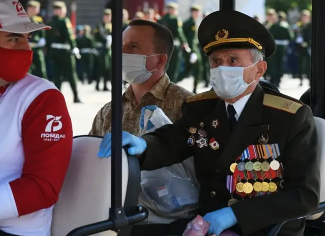 A veteran arrives for the Victory Day military parade in Red Square marking the 75th anniversary of the victory in World War II, on June 24, 2020 in Moscow