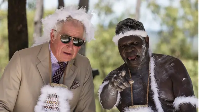 Prince Charles (L), the Prince of Wales, speaks with an indigenous Aboriginies" elder during a Welcome to Country Ceremony at Mt.Nhulun in Gove, Arnhem Land, Australia,