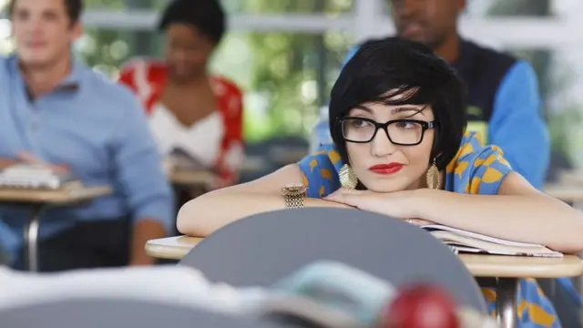 Bored student in class