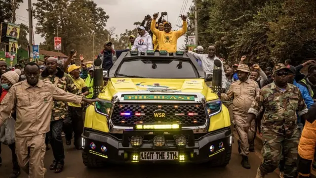 Kenya Deputy President and presidential candidate (C) of Kenya Kwanza (Kenya first) political party coalition arrive inside car during rally for Thika, Kenya on August 3, 2022 for Thika, Kenya