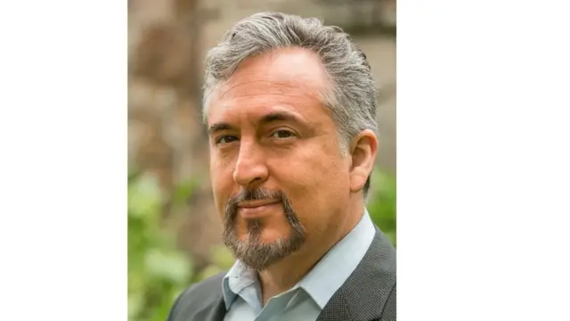 A. K. Sandoval-Strausz