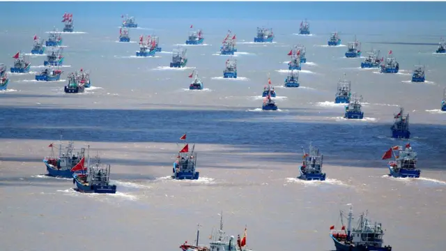 Chinese fishing vessels going out to sea