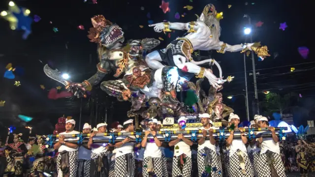 Two giant monster-like dolls at the Balinese New Year eve