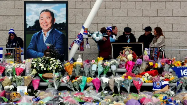 Fans react on the day a book of condolence opened for Leicester City"s owner Thai businessman Vichai Srivaddhanaprabha,