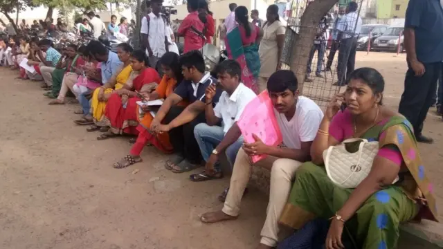 waiting in front of NEET exam centre.