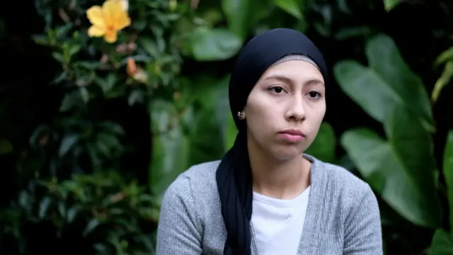 Mujer de la comunidad.