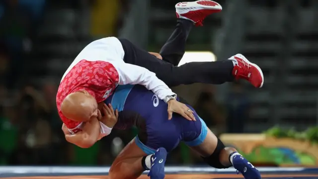 Risako Kawai con su entrenador