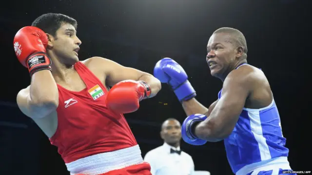 : India's Naman Tanwar competes against Tanzania's Haruna Mhando during the Boxing on day two of the Gold Coast 2018 Commonwealth Games at Oxenford Studios on April 6, 2018 on the Gold Coast, Australia.