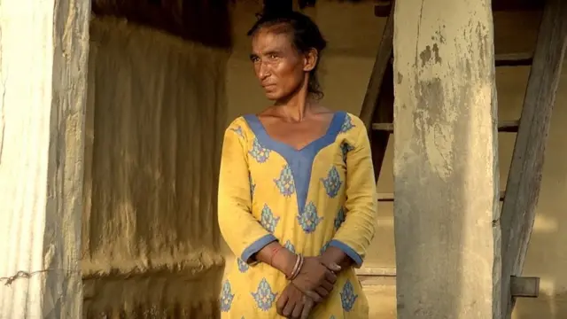 बाढीपीडित महिला