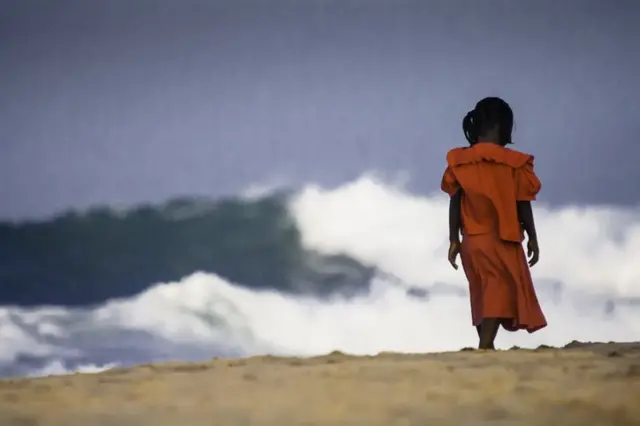 Girl walking in Arugambay