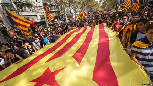 SEPTEMBER 28: Students carry a big Catalan Pro-Independence flag