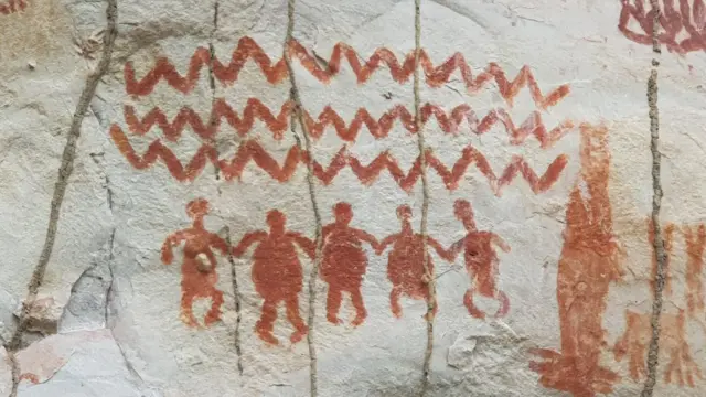 Ovaj crtež liči na ljude nalik kornjačama koji se drže za ruke