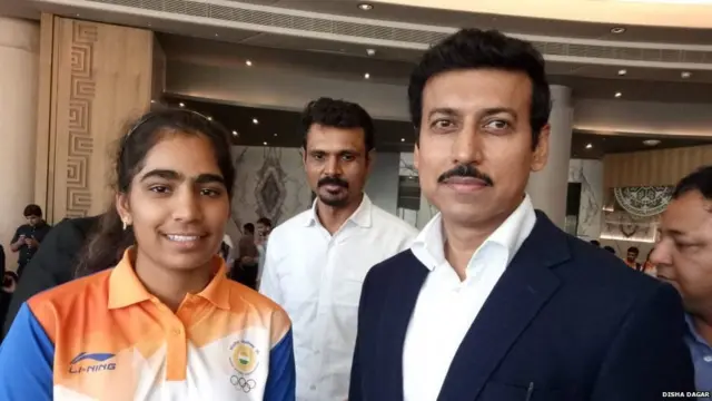 મંત્રી સાથેની તસવીર