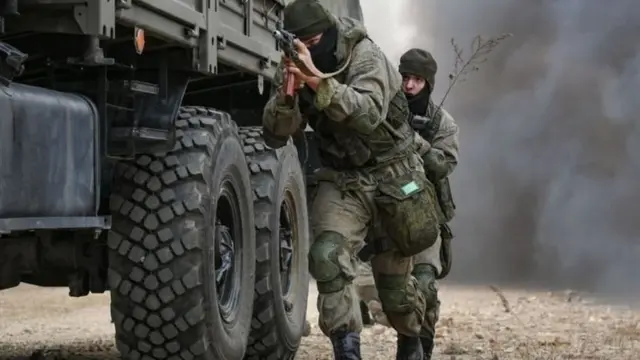 росія