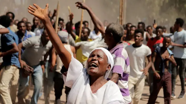 Supporters of Bekele Gerba, secretary general of the Oromo Federalist Congress (OFC), chant slogans to celebrate Gerba's release from prison, in Adama, Oromia Region, Ethiopia