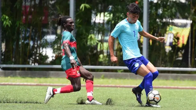 solomon playing football