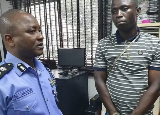 David West standing with a police officer