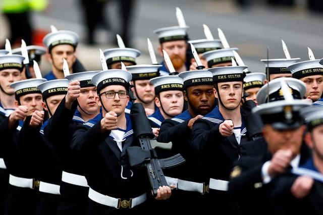 Members of the Navy march on the day of Britain's King Charles' coronation ceremony, in Whitehall
