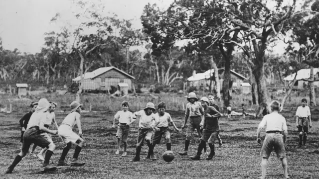 Boys play football at the Fairbridge school at Pinjarra