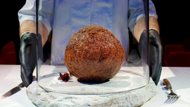 A meatball made from flesh cultivated using the DNA of an extinct woolly mammoth