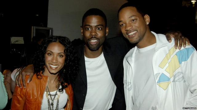 Chris Rock, with Will Smith and Jada Pinkett Smith as dem dey chill for 2005