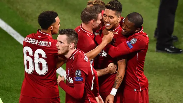 Liverpool players celebrate as Firmino score late goal to beat PSG 3-2